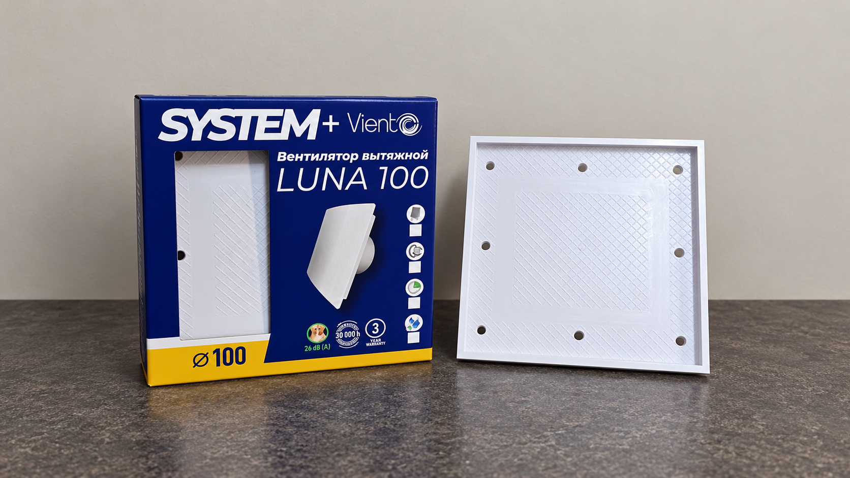 Лицевая панель вентилятора LUNA INSIDE 100 под плитку рядом с упаковкой